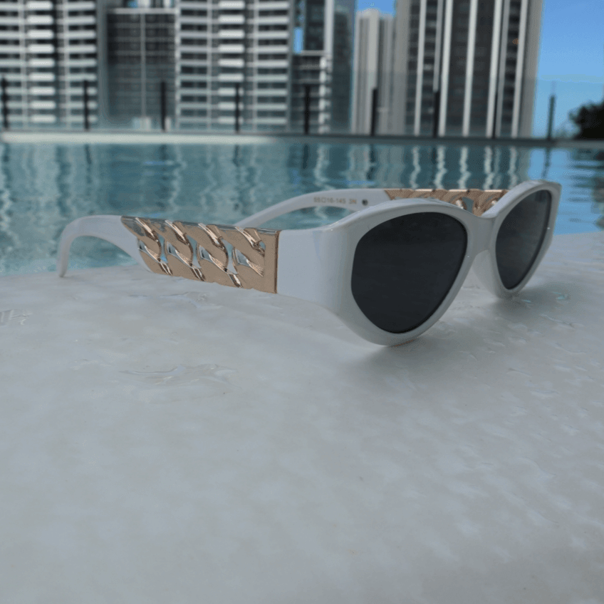 Vogue Shades: Ultimate Baddie Beach Eyewear Shop Vogue Shades for superior protection & style. Gold-enhanced frames perfect for beach & driving. Available in black & white. UV400 protection.